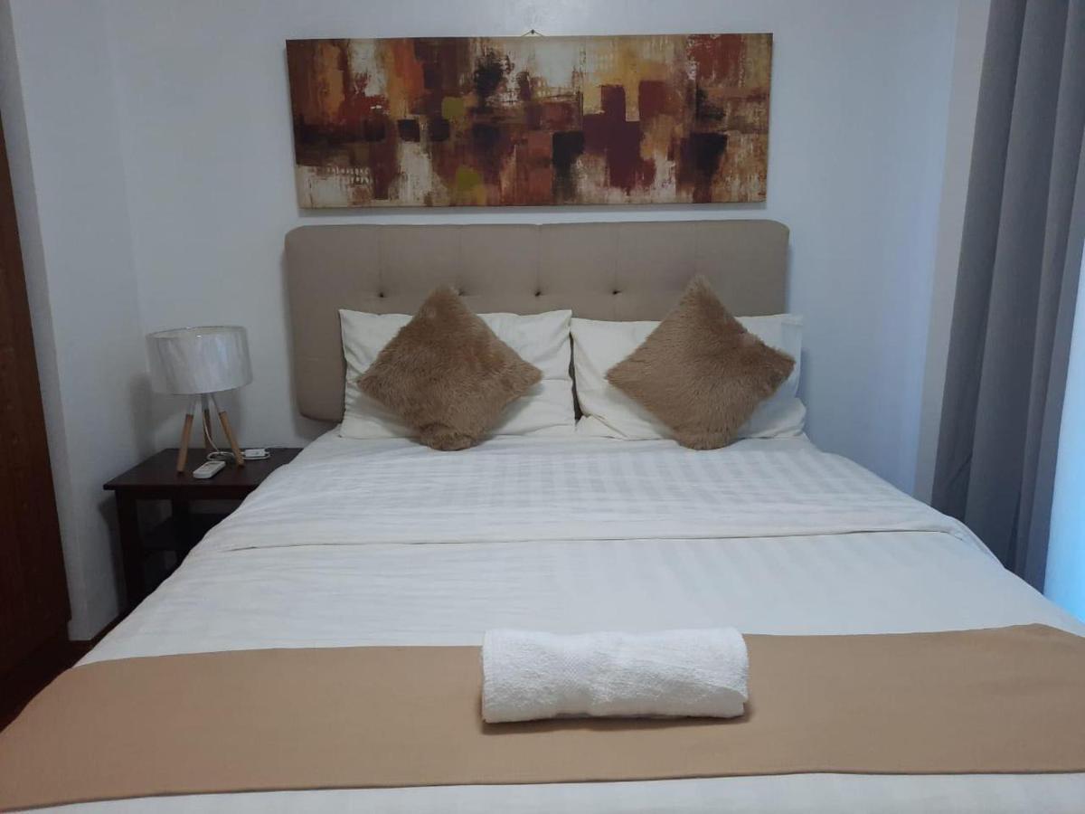 Affordable Makati Apt Manila Bagian luar foto